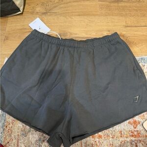 Brand new gymshark fleece shorts size Large in green